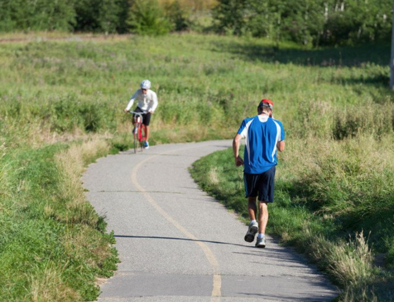 Calgarians running and cycling